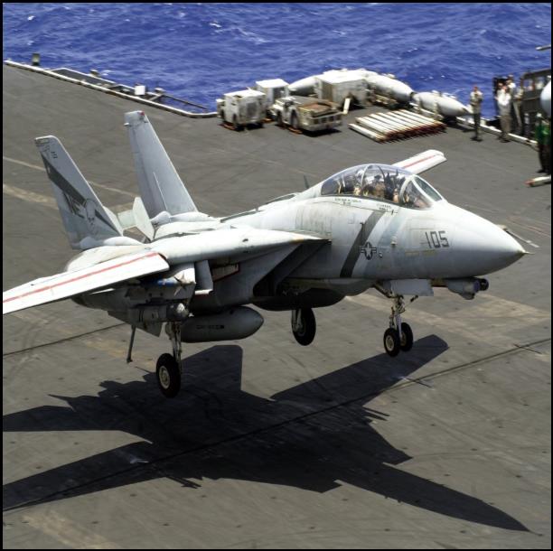 http://upload.wikimedia.org/wikipedia/commons/8/8a/US_Navy_030518-N-0295M-008_An_F-14D_Tomcat_comes_in_for_a_landing_aboard_the_aircraft_carrier_USS_Constellation_%28CV-64%29_after_completing_Aerial_Combat_Maneuvers_%28ACM%29_training.jpg