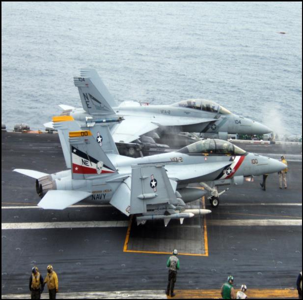 http://upload.wikimedia.org/wikipedia/commons/8/85/US_Navy_050714-N-0000I-004_F-A-18F_Super_Hornets_prepare_to_launch_from_the_flight_deck_aboard_the_USS_Abraham_Lincoln_%28CVN_72%29.jpg