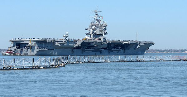 The aircraft carrier USS Enterprise (CVN 65) departs Naval Station Norfolk for the ship's 22nd and final deployment.
