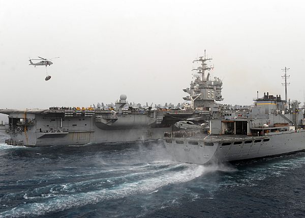 USS Enterprise and USNS Supply conduct a replenishment at sea.