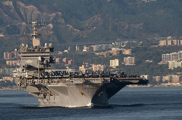The aircraft carrier USS Enterprise (CVN 65) transits the Strait of Messina.